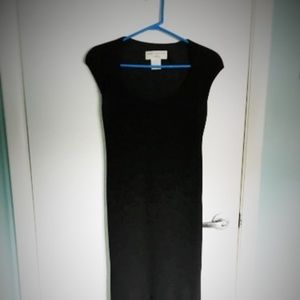 Cap sleeved, calf length black dress